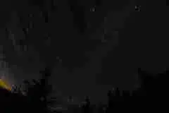 Daylight surrenders to the night