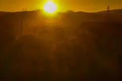 theearlymorningraysofthesuncaressthedesertlandscape.jpg